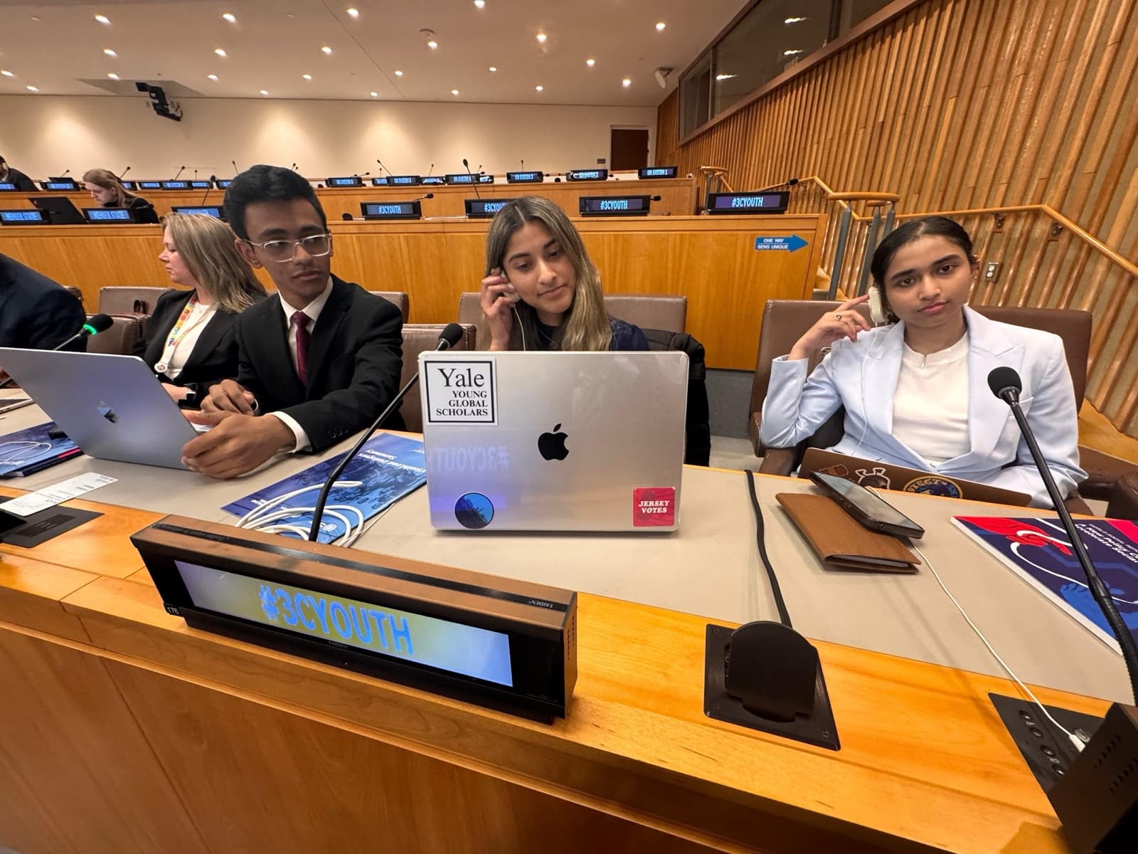 Whitestone analysts seated at United Nations committee desks